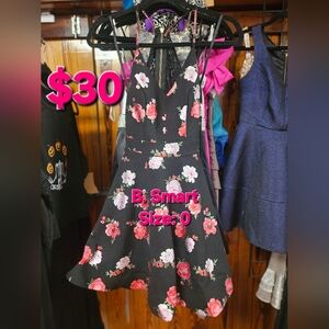B. Smart Black Dress with Pink Floral Design